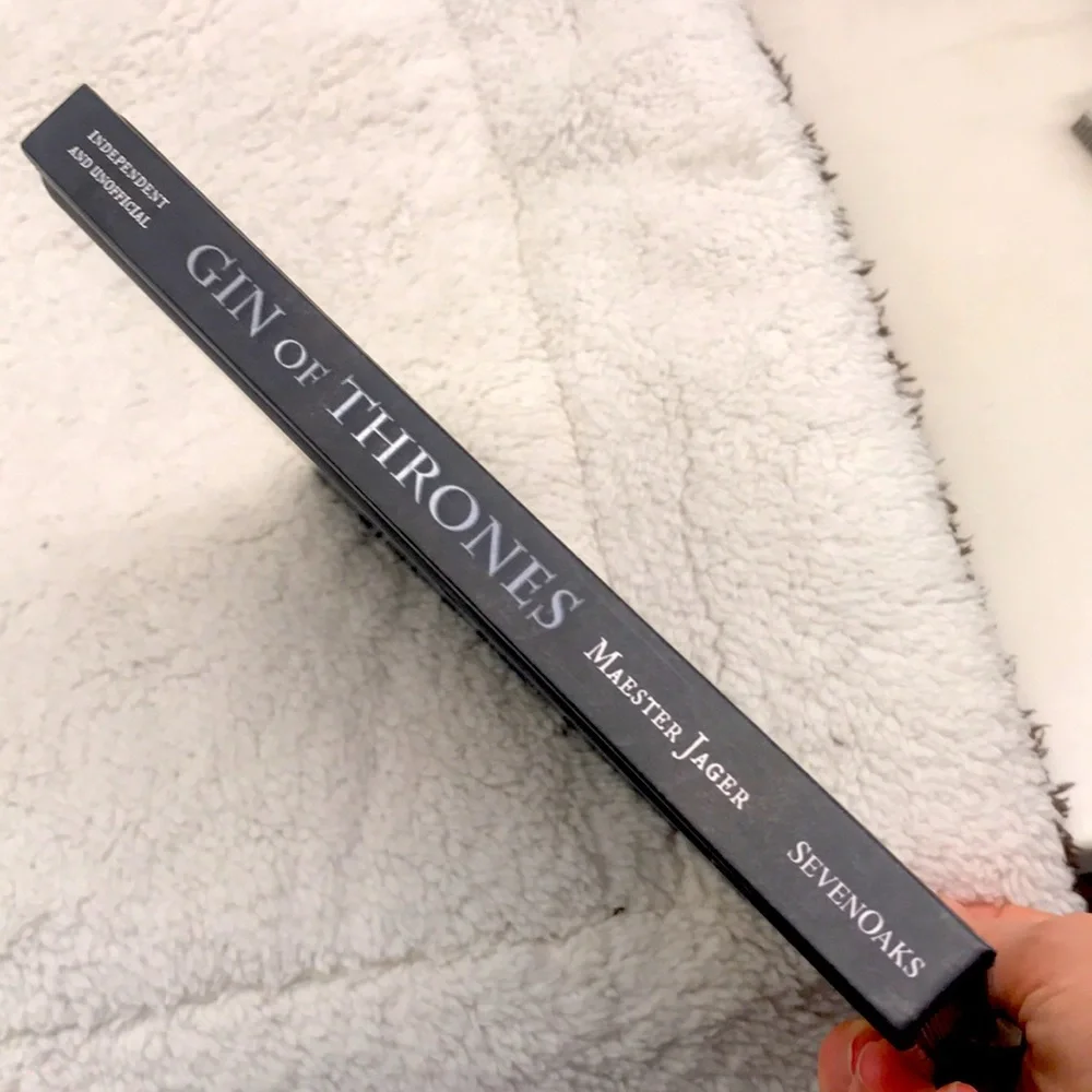 Gin of Thrones - Hardcover. NEW. 144 pp. Color illustrations & cocktail recipes.